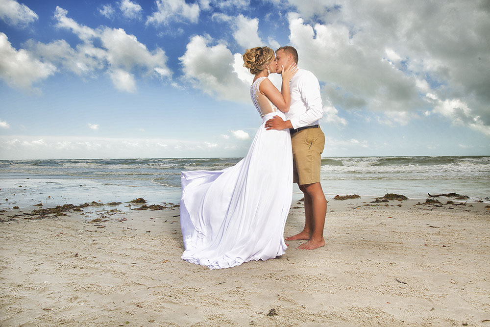 Beach wedding couple photography by Chris Kovaz