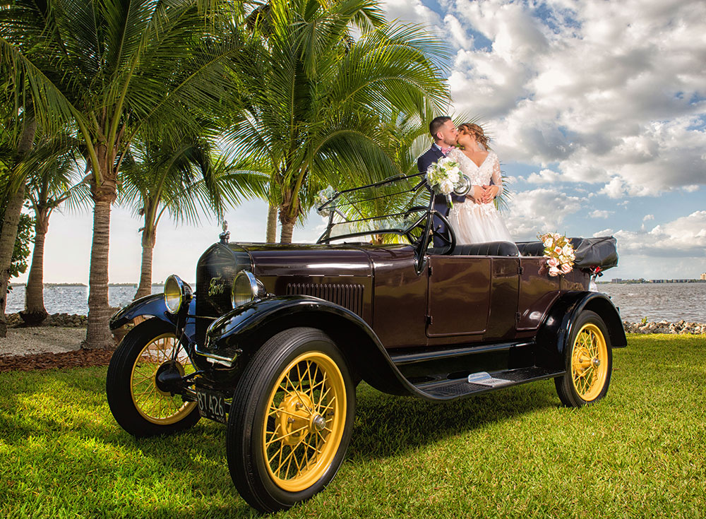 Antique car wedding photo by Chris Kovaz