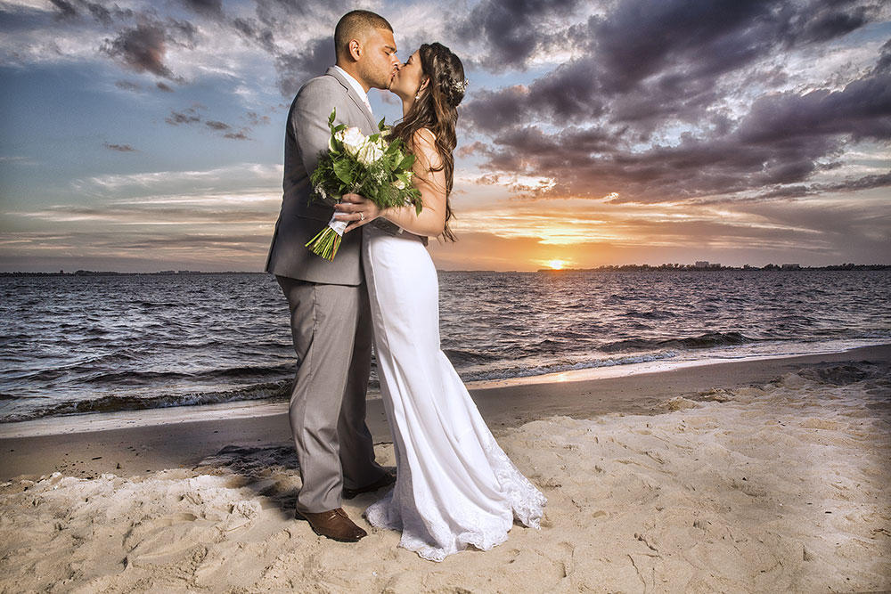 Beach sunset wedding photography in SW Florida by Chris Kovaz