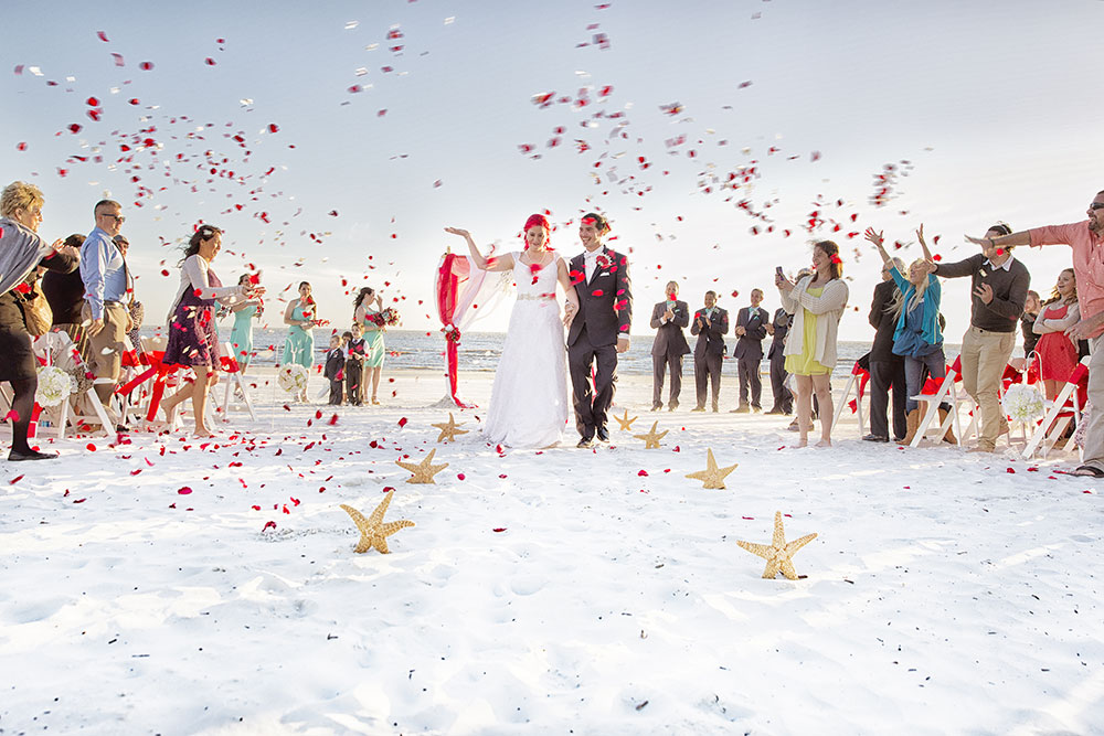 Wedding ceremony with confetti on the beach